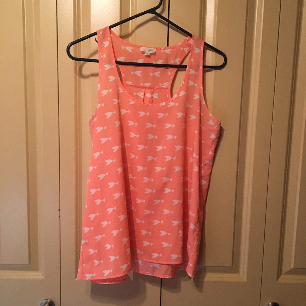 Pink tank with white fish